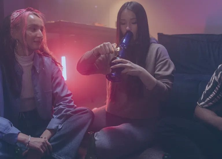 inhaling cannabis through a bong
