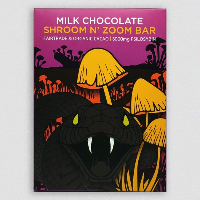 Mamba Milk Chocolates | Shroom N' Zoom Bar is the perfect way to get to Mars on a Budget! Made with 3000mg of Golden Teacher Mushrooms, this bar combines the best of both worlds – delectable Milk chocolate and powerful psychedelic effects from psilocybin. With its smooth texture, rich flavor and bold taste, Mamba Milk Chocolates will take you on a triumphant journey for an excitingly new experience. Let Mamba's Shroom N' Zoom Milk Chocolate Bar unleash your full potential and make every bite an unforgettable moment!